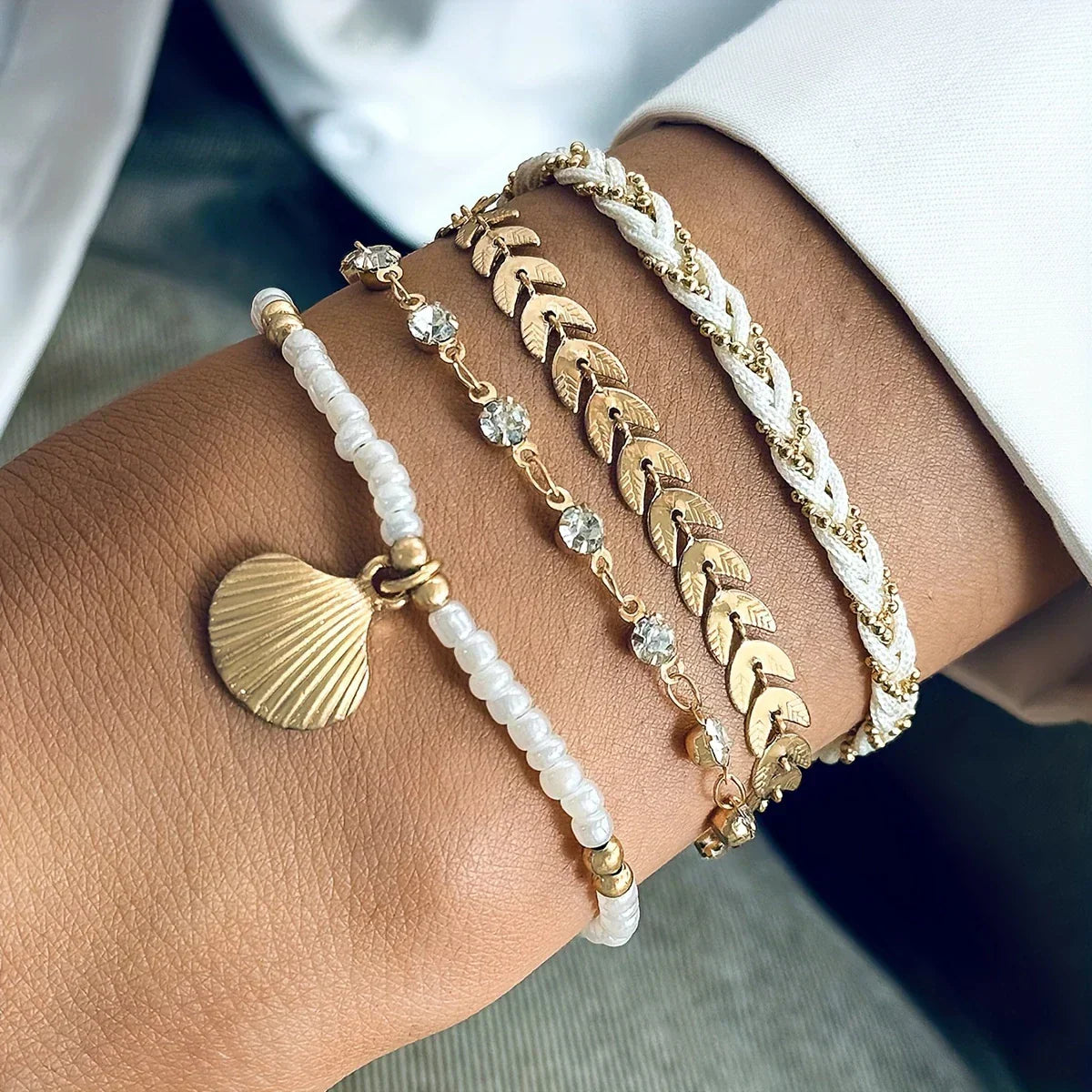 Gold shell bracelet set detail