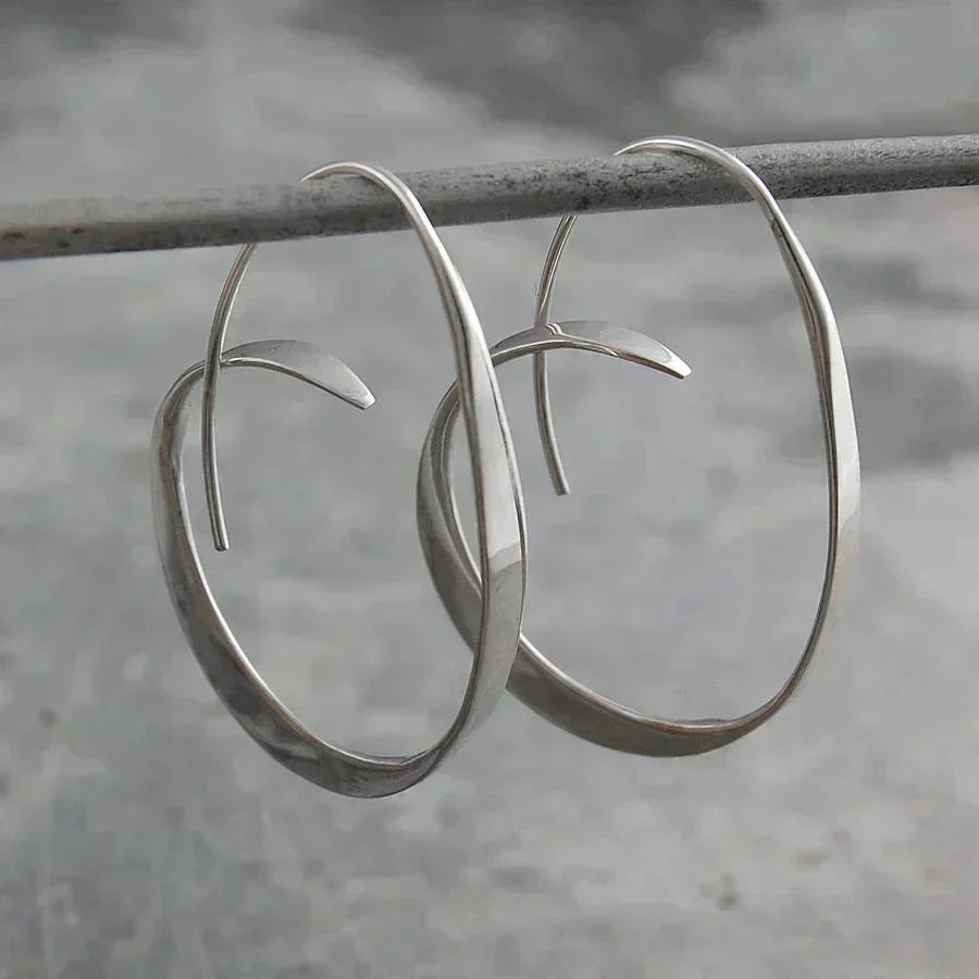 Spiral earrings silver product shot
