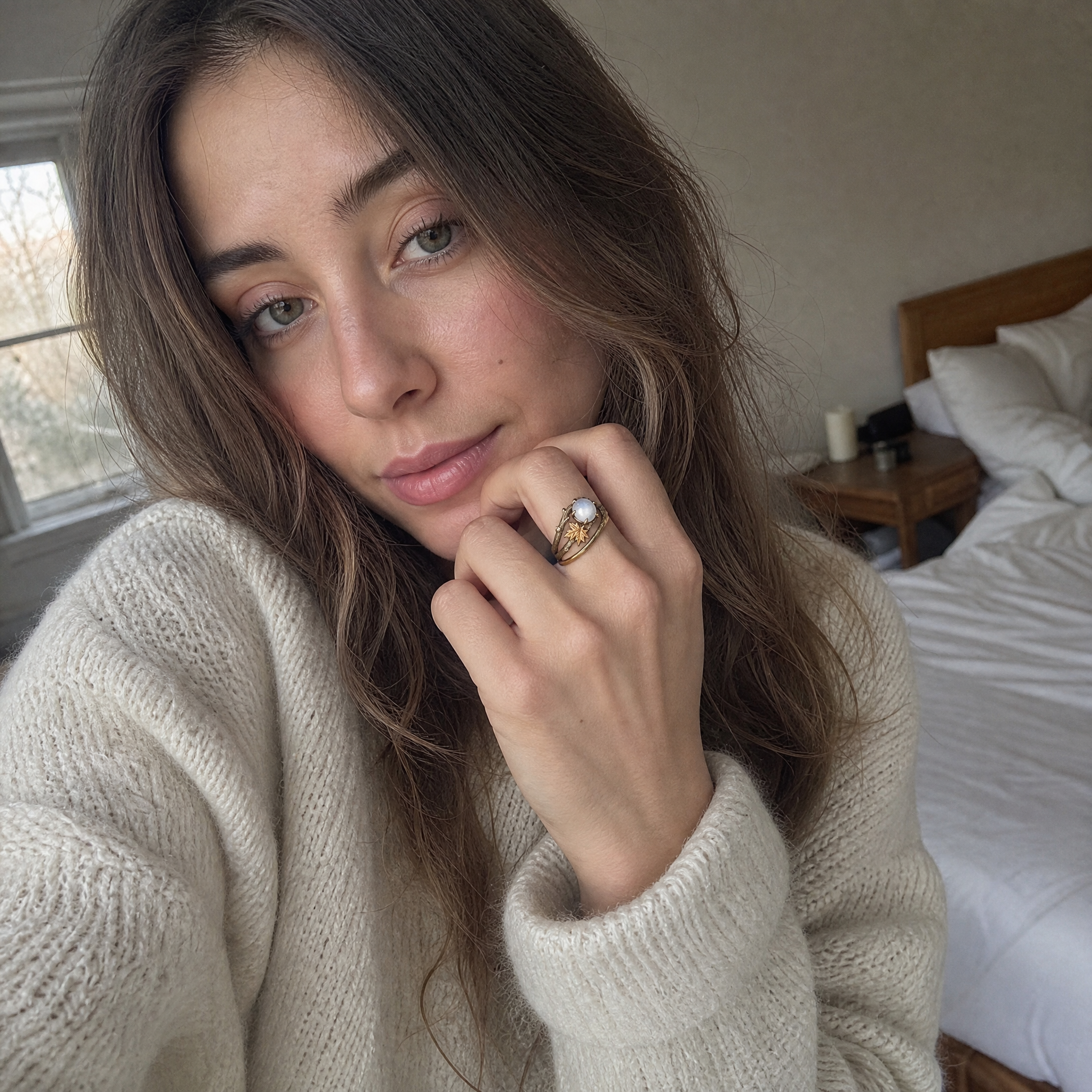 Moonstone ring gold worn on hand